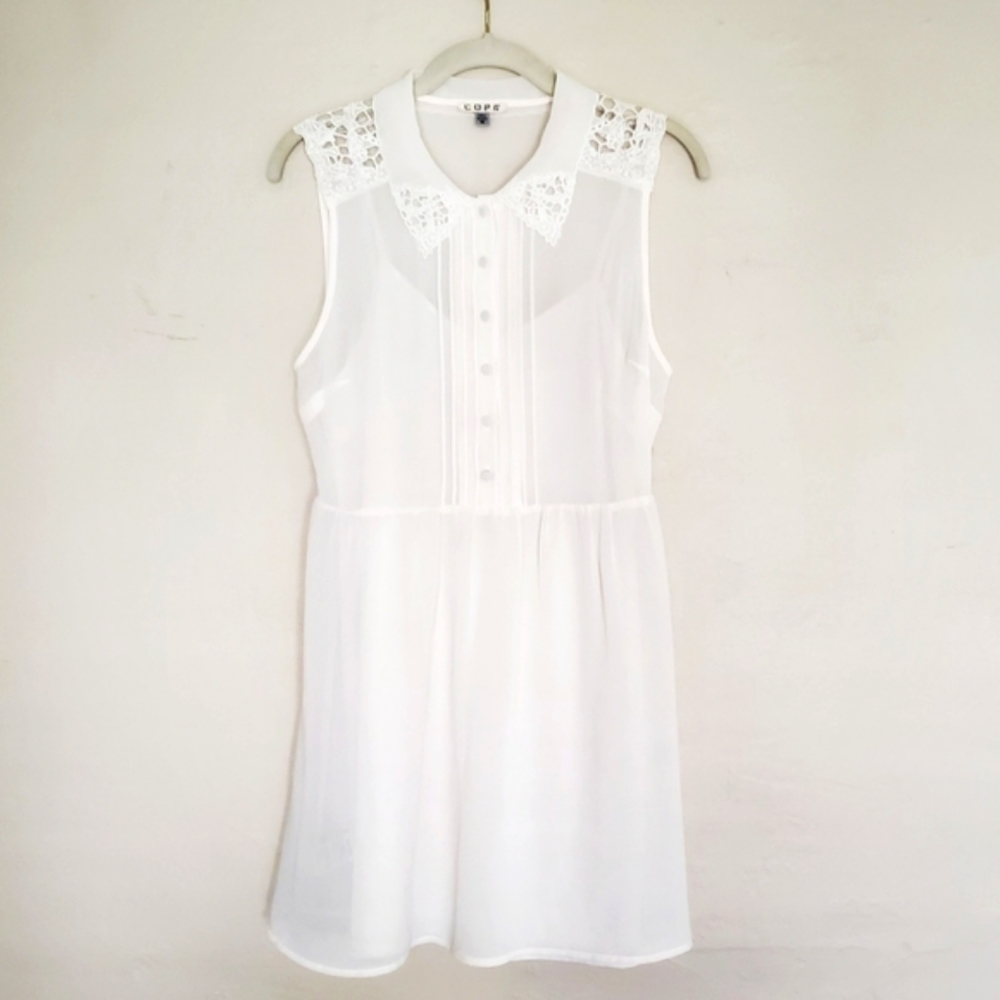 Lace trimmed sheer white dress